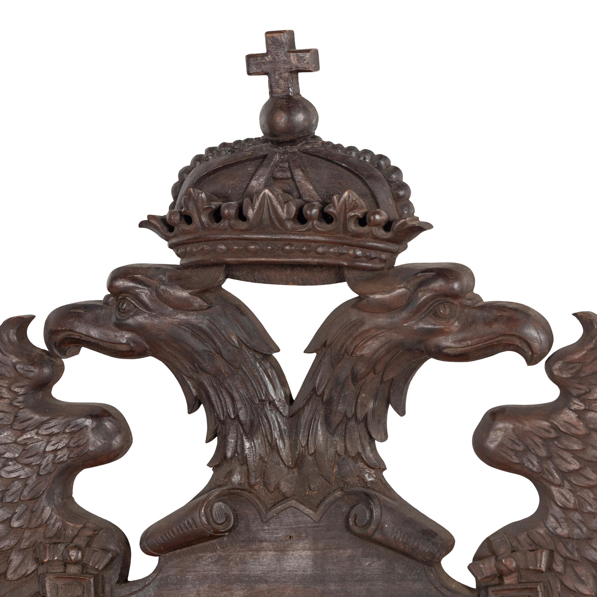 A Continental Carved Oak Wall Plaque