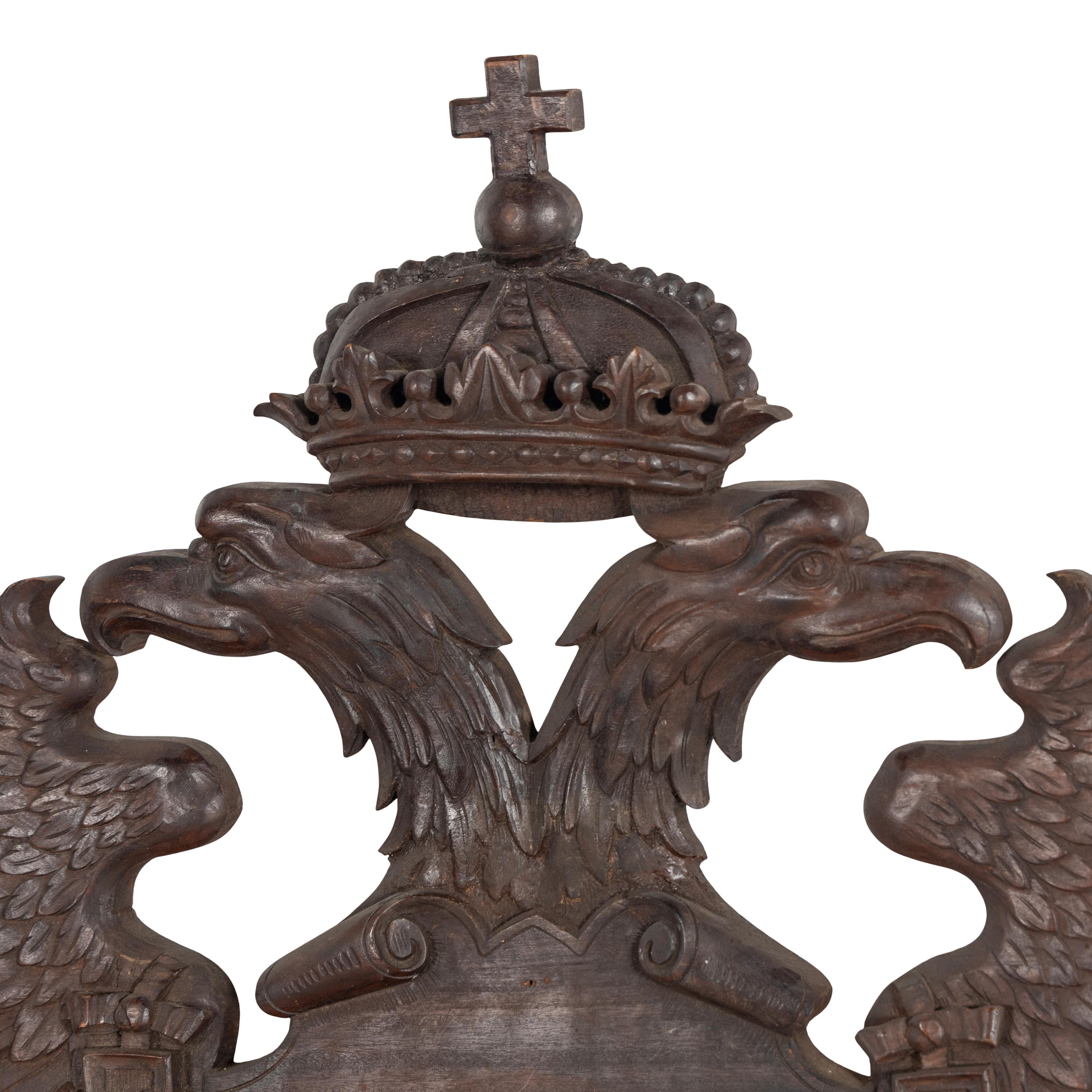 A Continental Carved Oak Wall Plaque