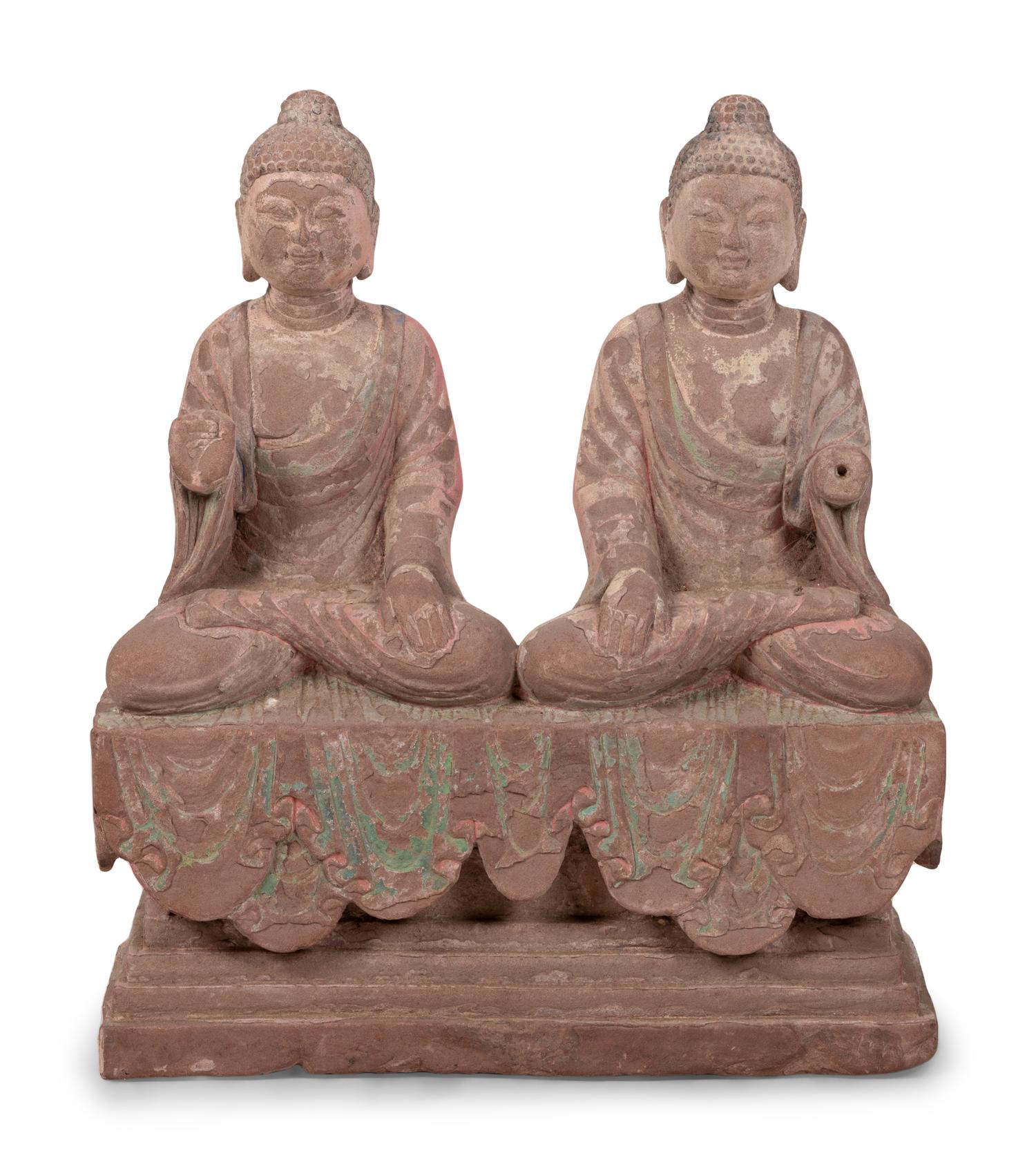 Two Chinese Carved Stone Seated Figures on a Rectangular Base with Remnants of Polychrome Decoration