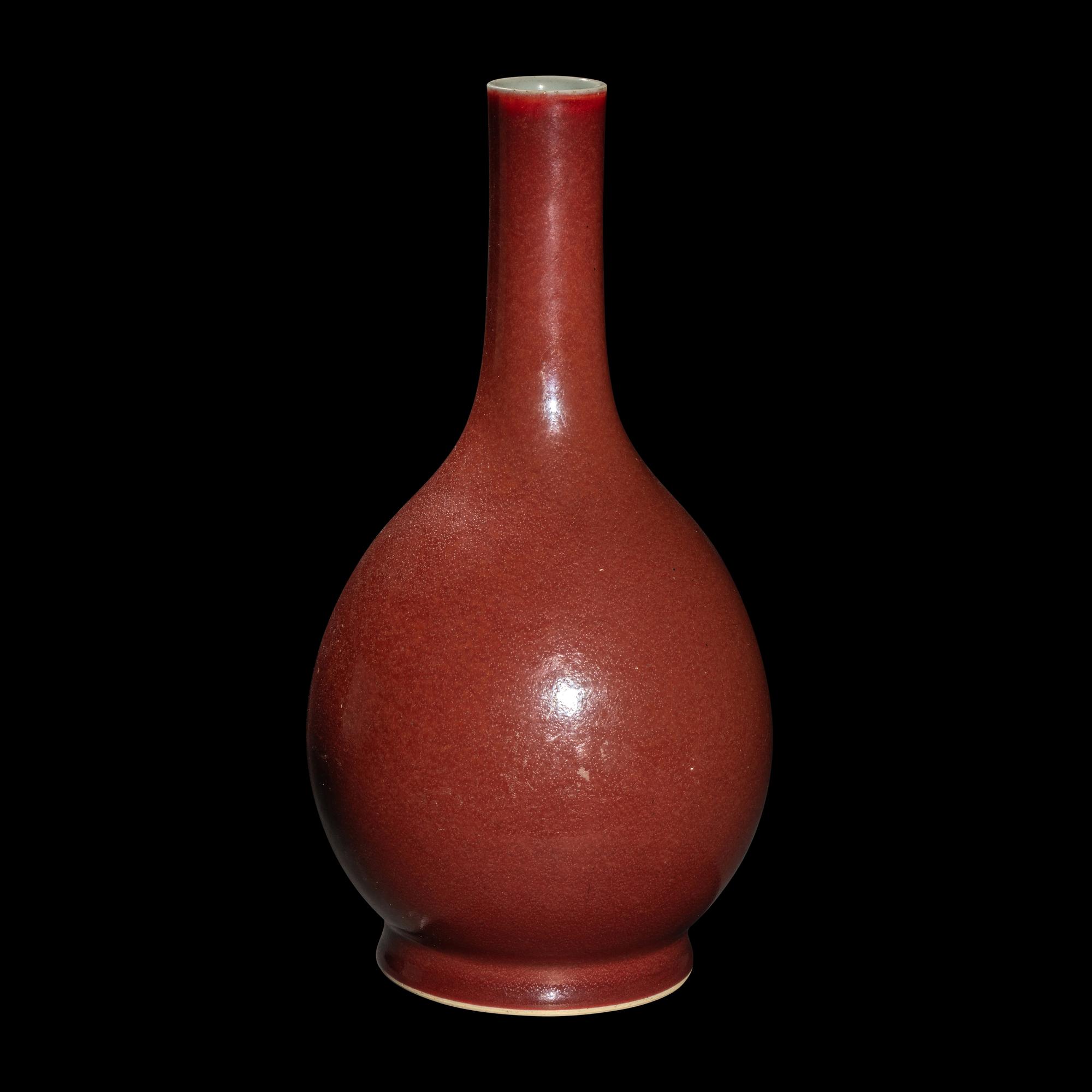 A Chinese Sang-de-Boeuf Glazed Porcelain Bottle Vase, 18th/19th Century 清中期 寶石紅釉賞瓶
