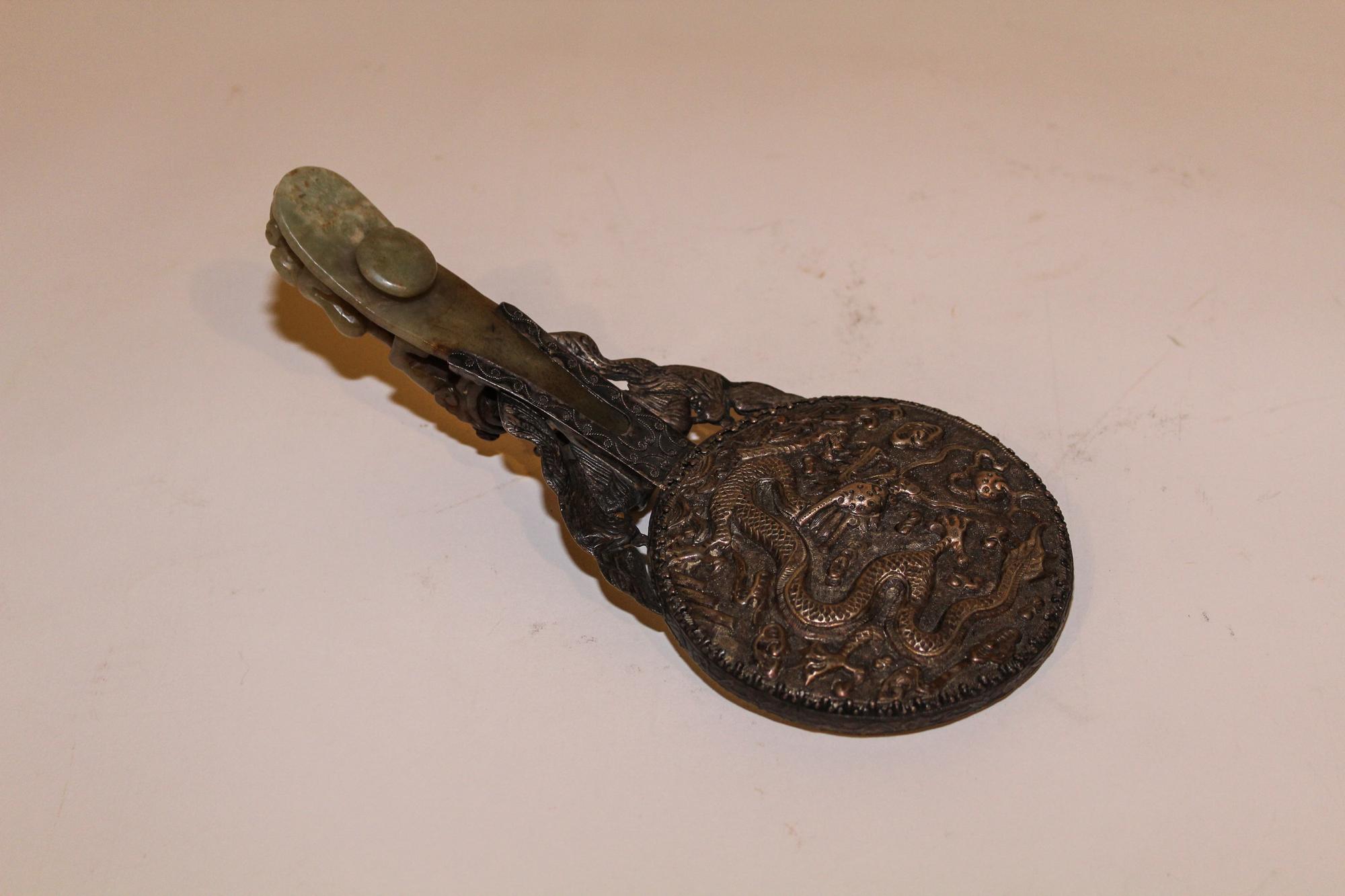 A Chinese Jade and Silver Mounted Hand Mirror Height 9 inches.