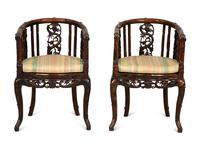 A Pair of Chinese Hongmu Horseshoe Back Carved Armchairs