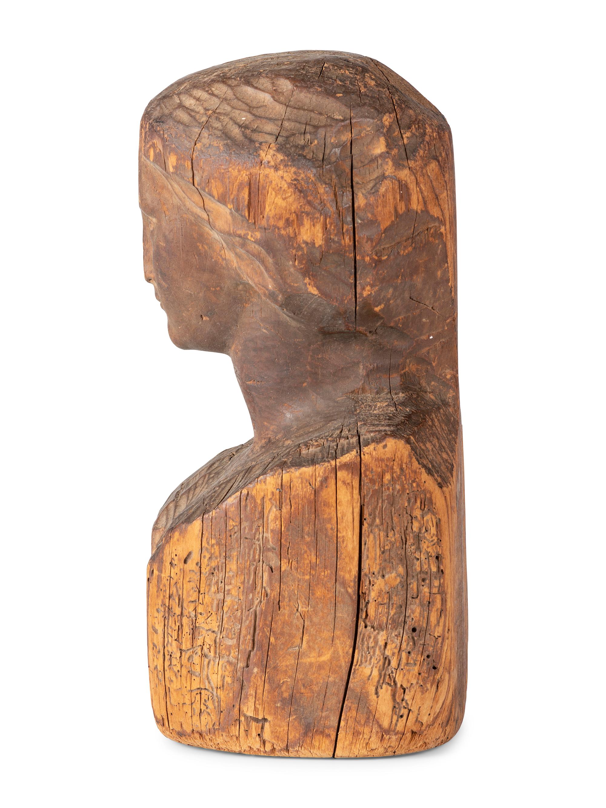 A Folk Art Carved Wood Female Head