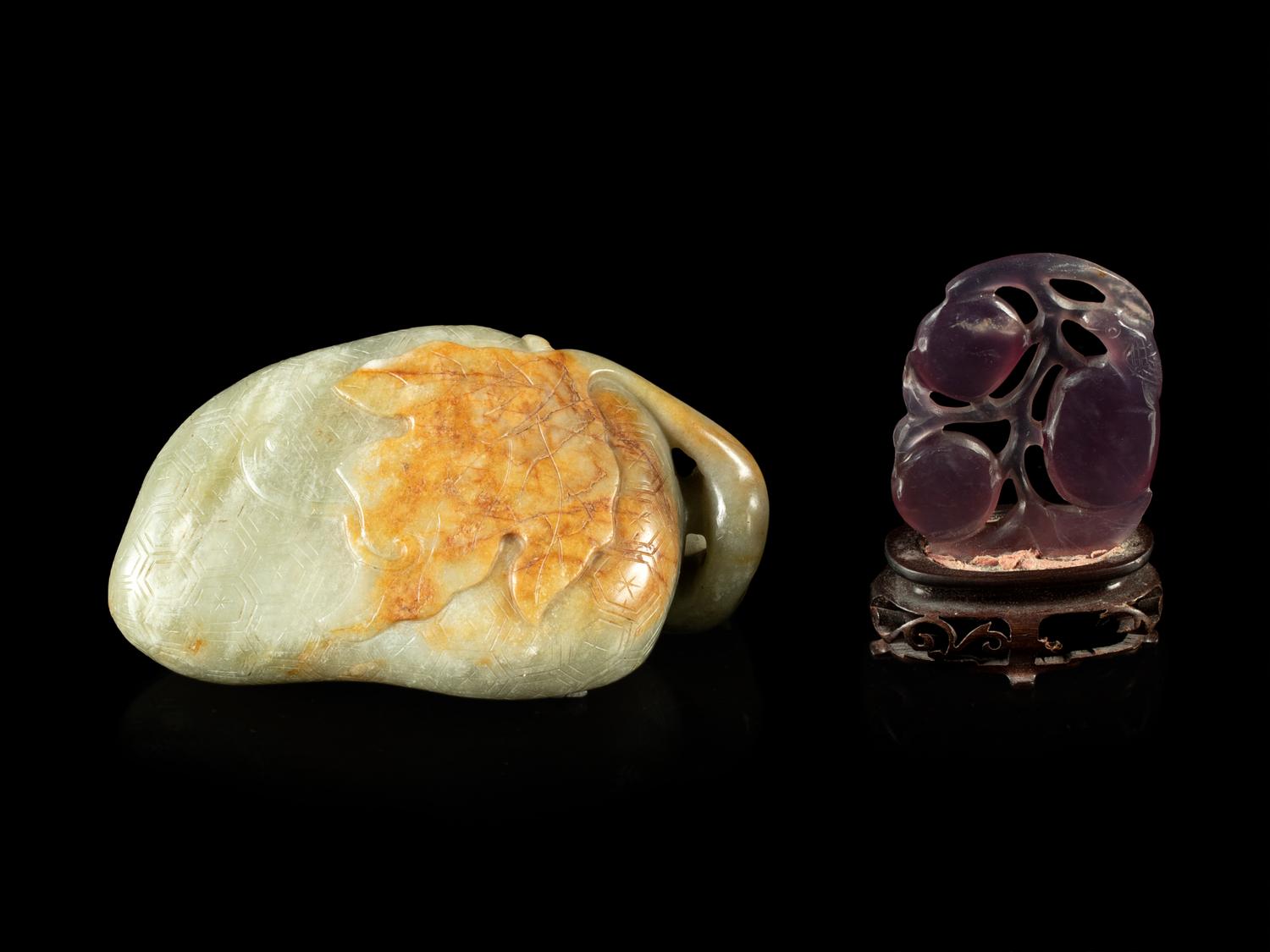 A Celadon Jade 'Lychee' Carving and An Amethyst 'Fruit' Pendant