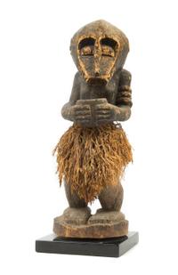 A Baule Wood and Raffia Monkey Figure Height 18 1/2 inches. — 20TH CENTURY