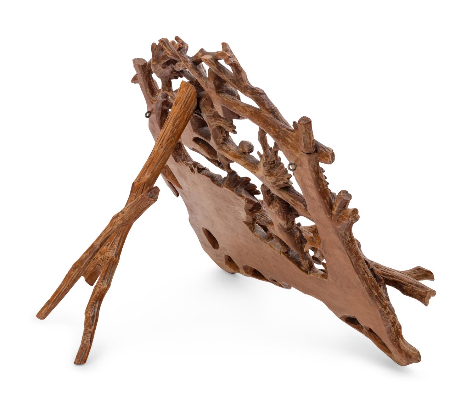 A Black Forest Carved Music Stand