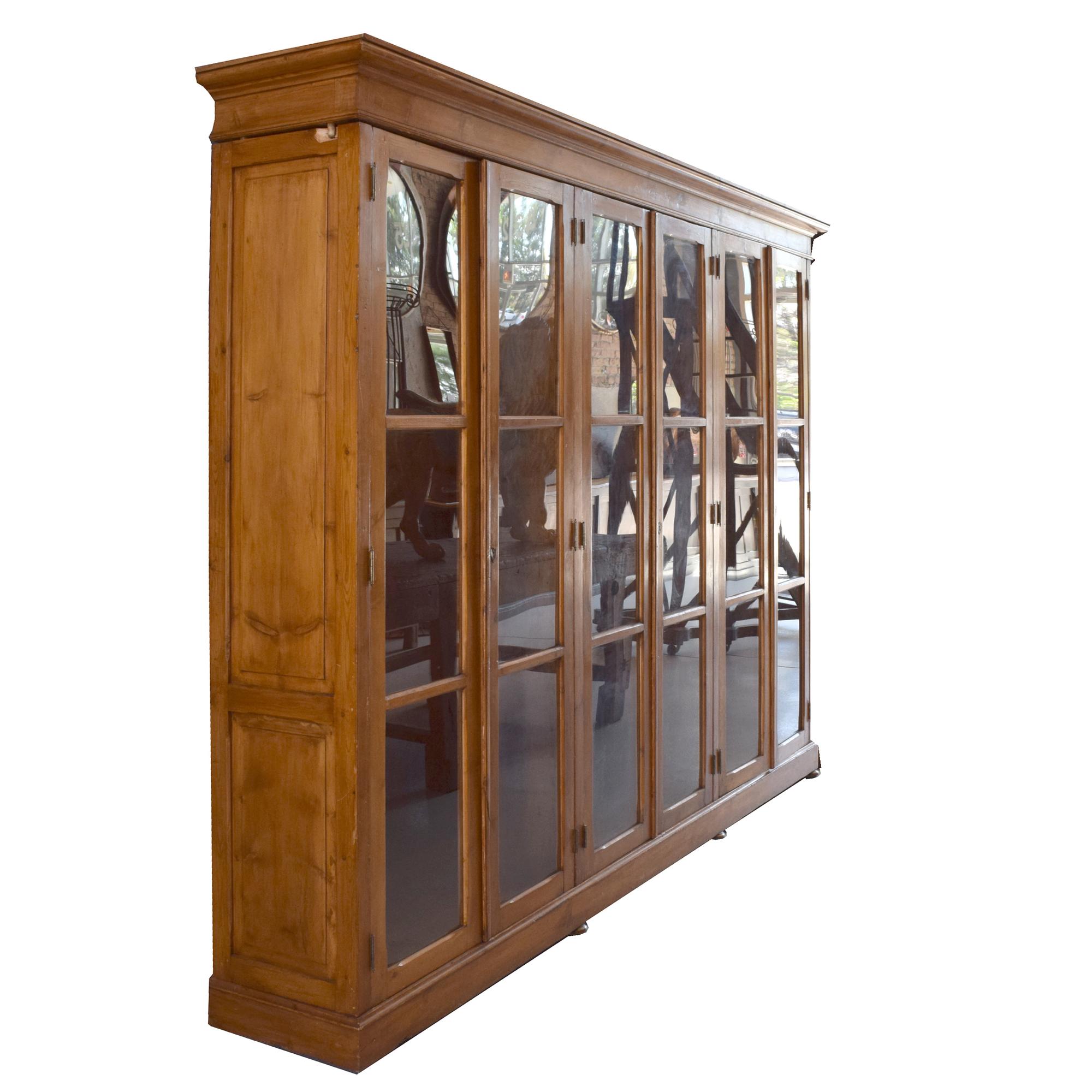 A Pine Library Cabinet 118.5" W x 21" D x 93" H — Italy, Circa 1910