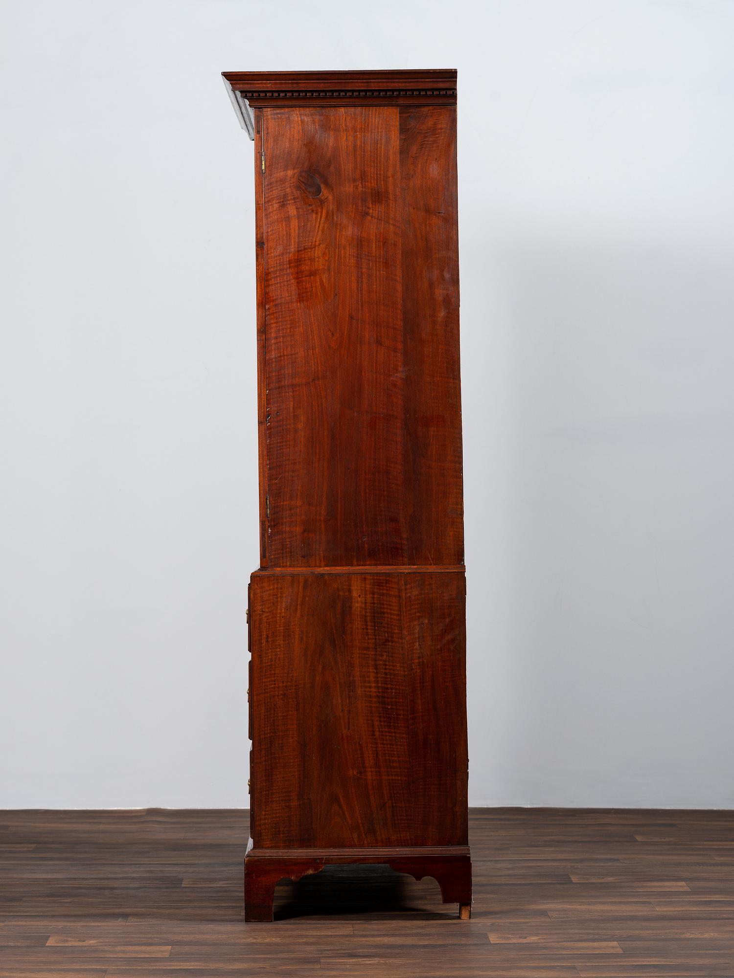 A Chippendale Figured Mahogany Linen Press