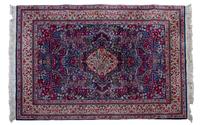 A Persian Wool Carpet, 6 feet 7 inches x 4 feet 5 inches.