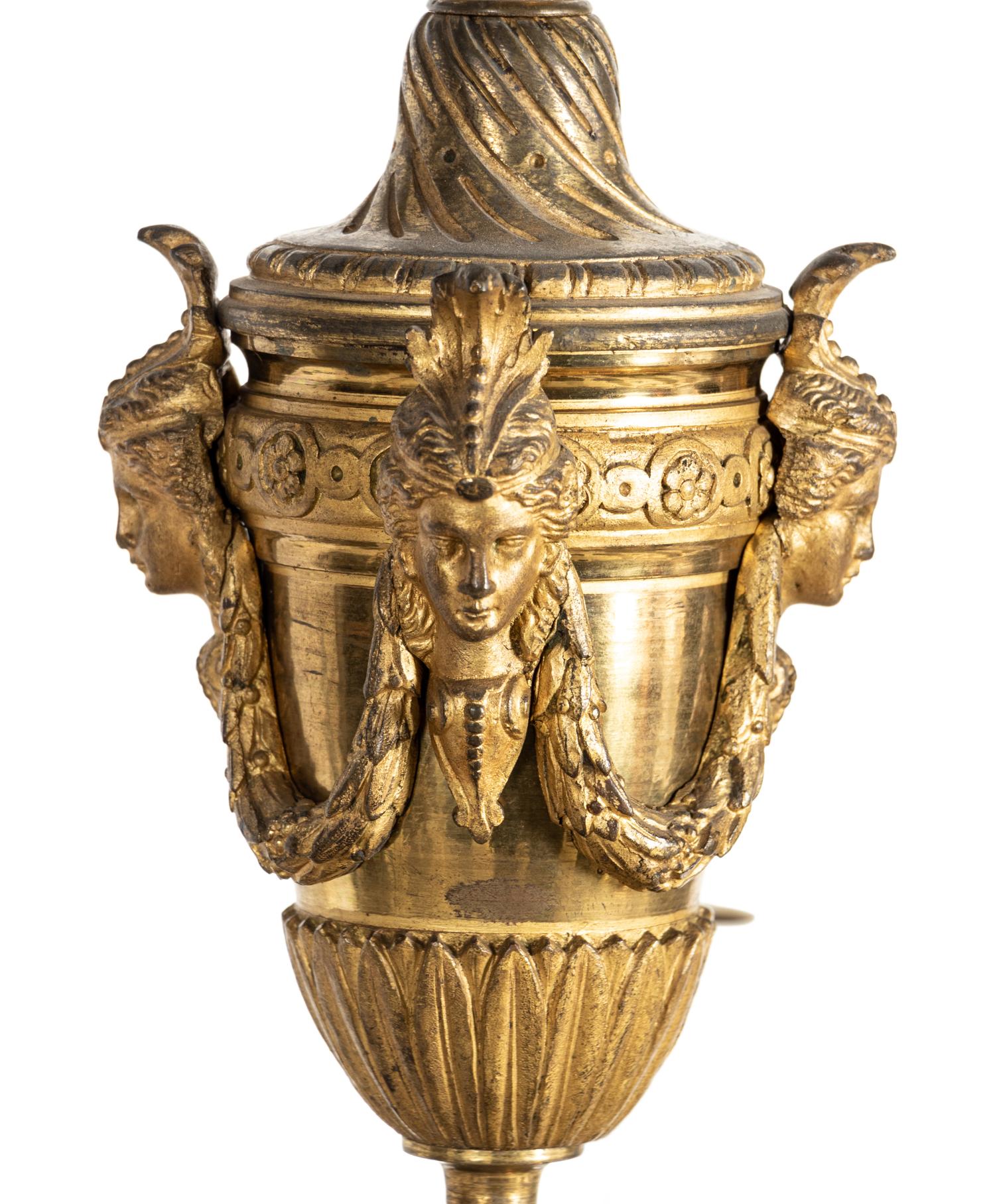 A Louis XVI Style Gilt Bronze Sixteen-Light Chandelier