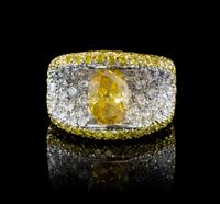 A 19 Karat Gold, Fancy Color Diamond and Diamond Ring, 11.00 dwts.