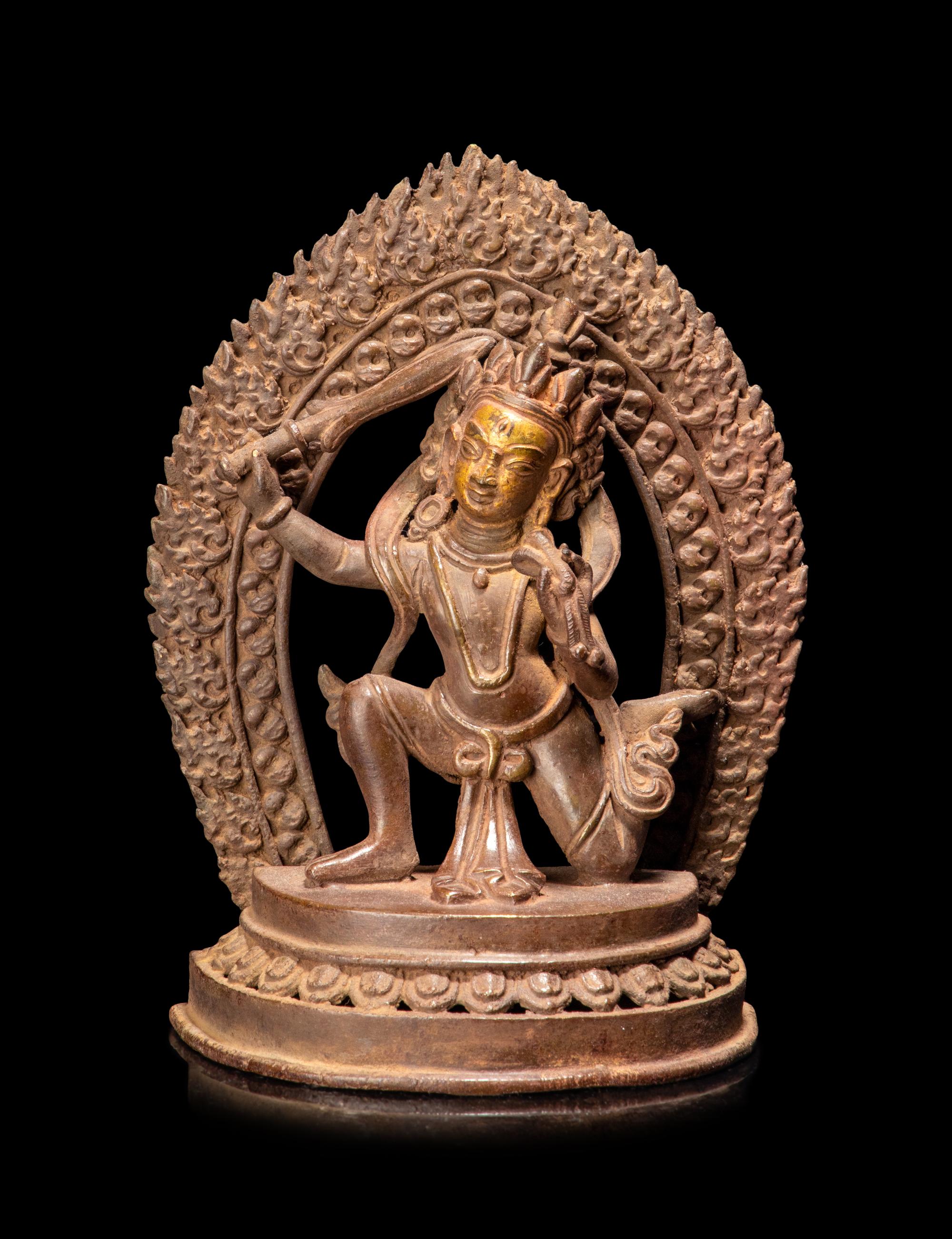 A Sino-Tibetan Bronze Figure of a Deity