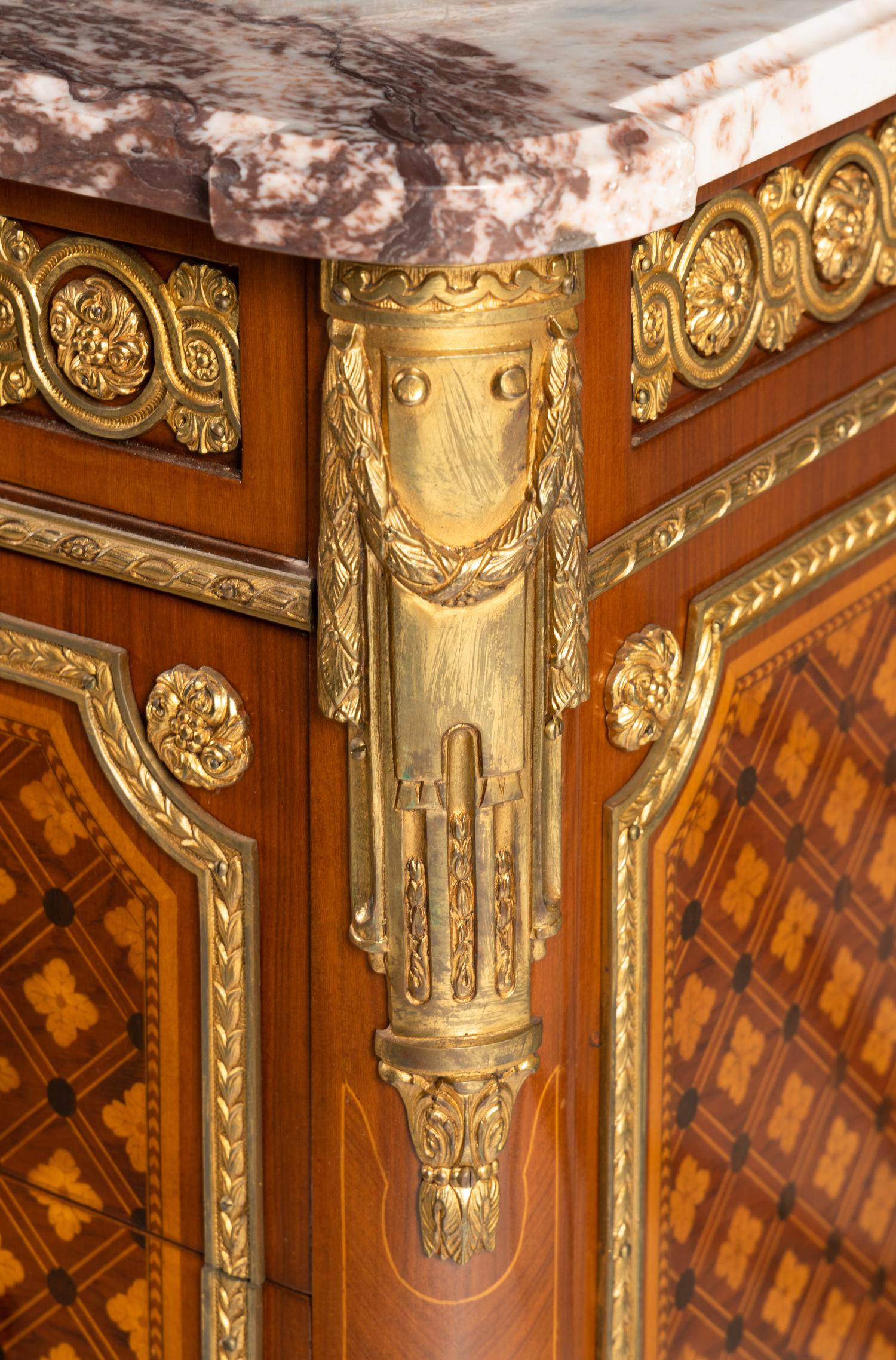 A Louis XVI Style Marquetry Marble-Top Commode