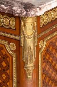 A Louis XVI Style Marquetry Marble-Top Commode