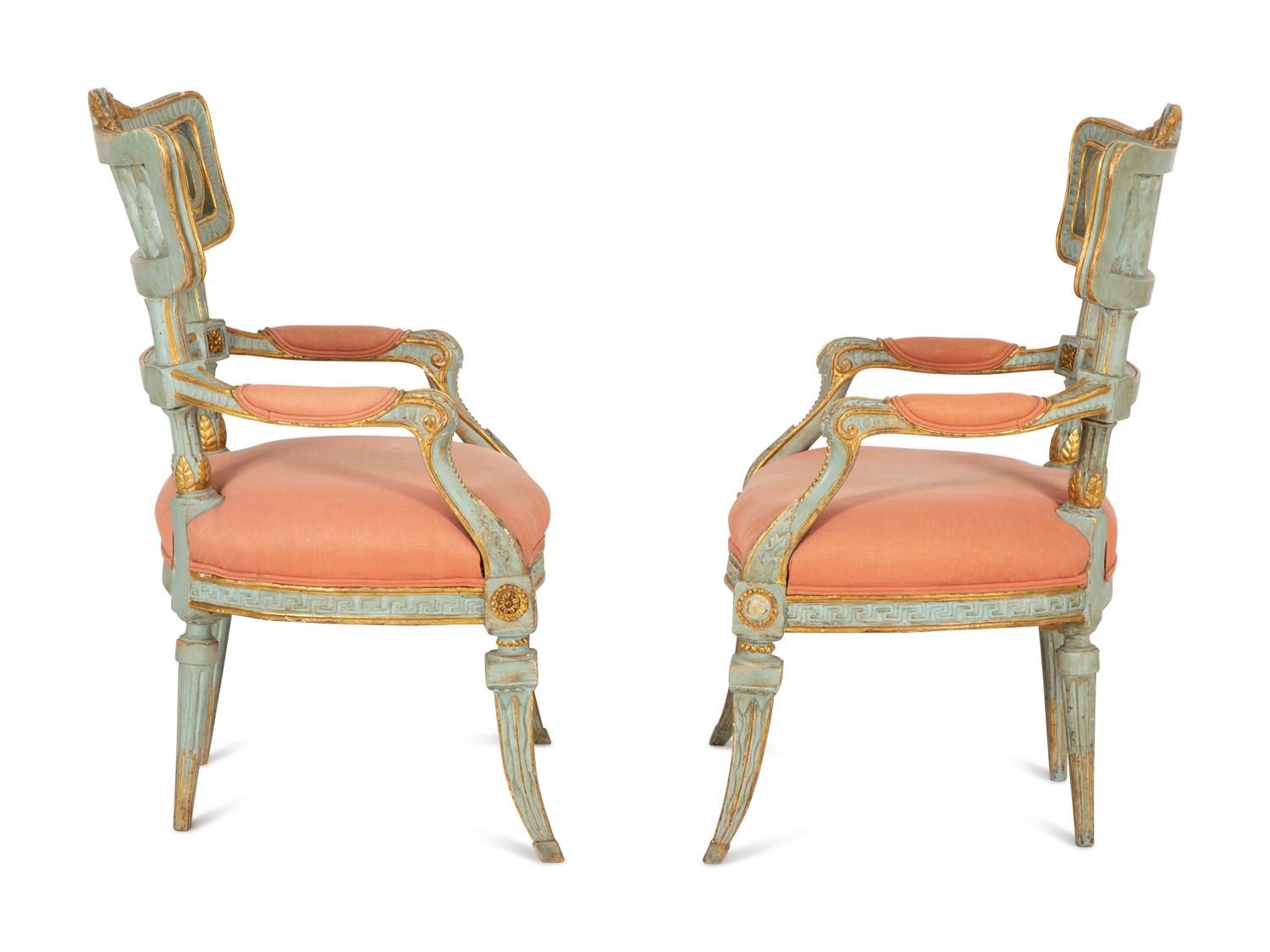 A Pair of Venetian Painted and Parcel Gilt Armchairs