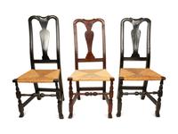 Three William and Mary Turned and Carved Rush-Seat Spanish-Foot Side Chairs
