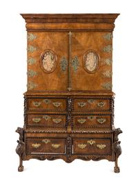 A Continental Baroque Brass Mounted Walnut Cabinet on Chest