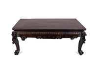 A Chinese Carved Hardwood Low Table — 19TH CENTURY