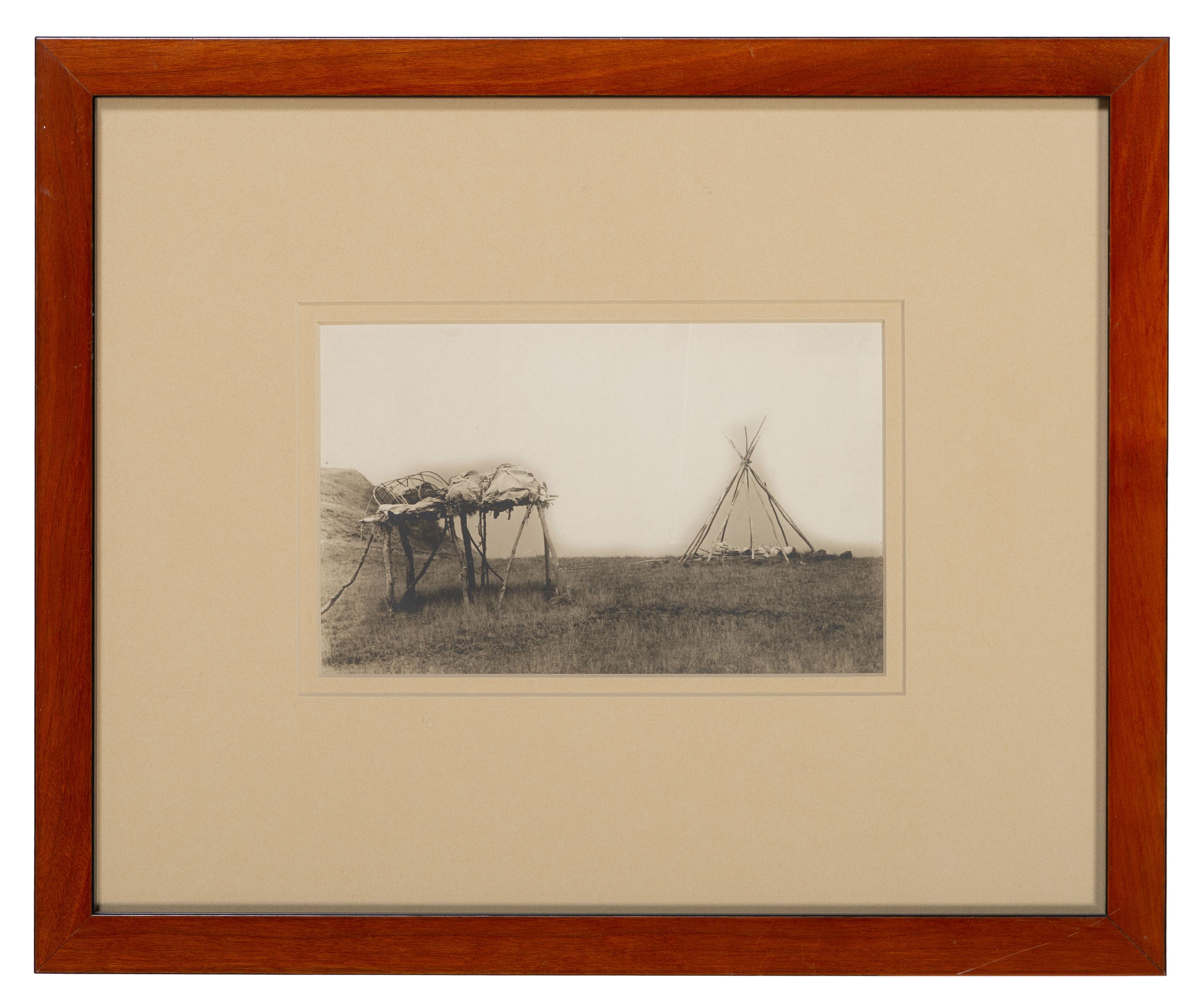 BARRY, David F. (1854-1934), photographer. Photograph of an Indian funeral scaffold with a tipi frame.