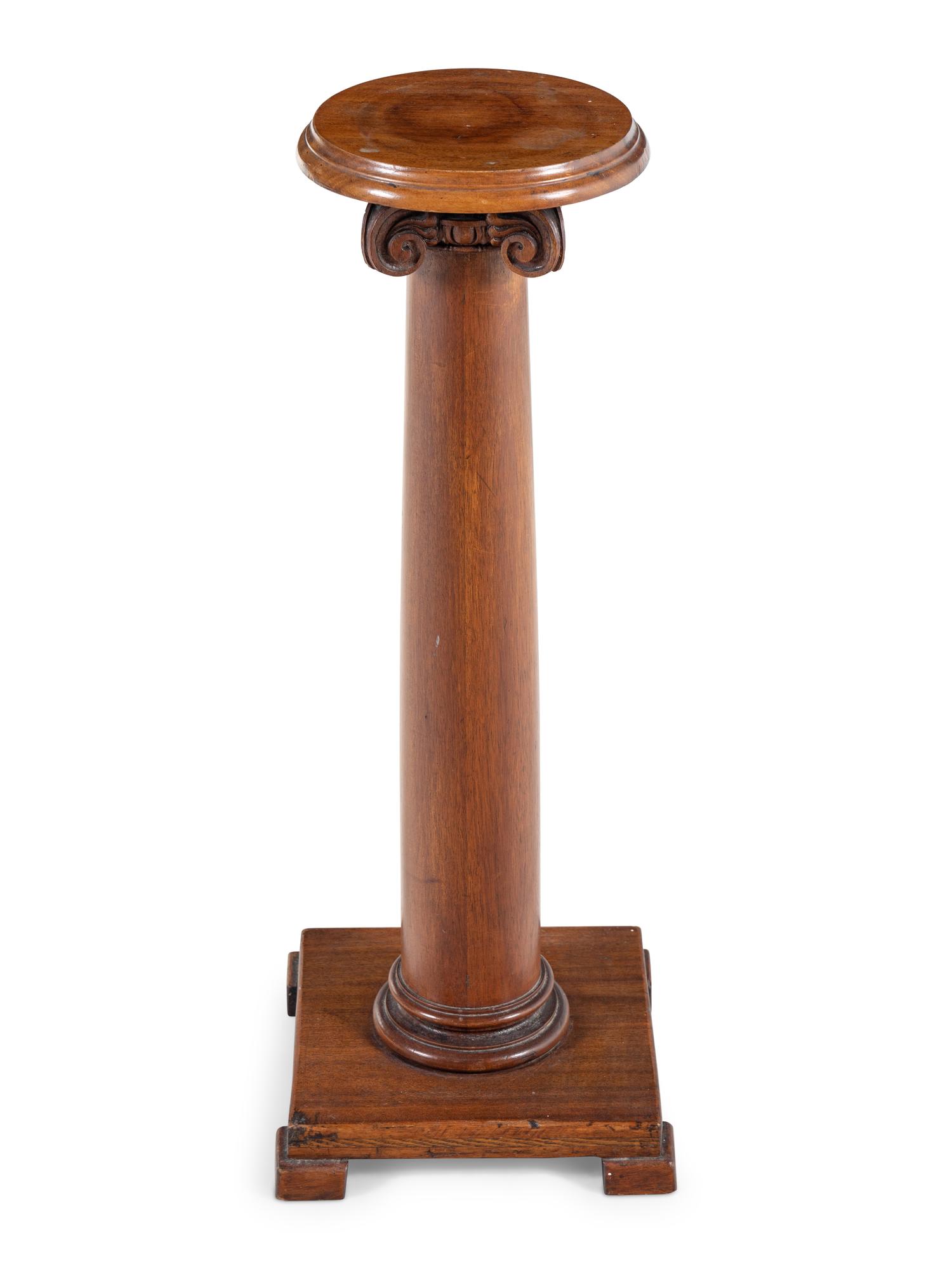 A Carved Mahogany Pedestal
