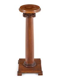 A Carved Mahogany Pedestal