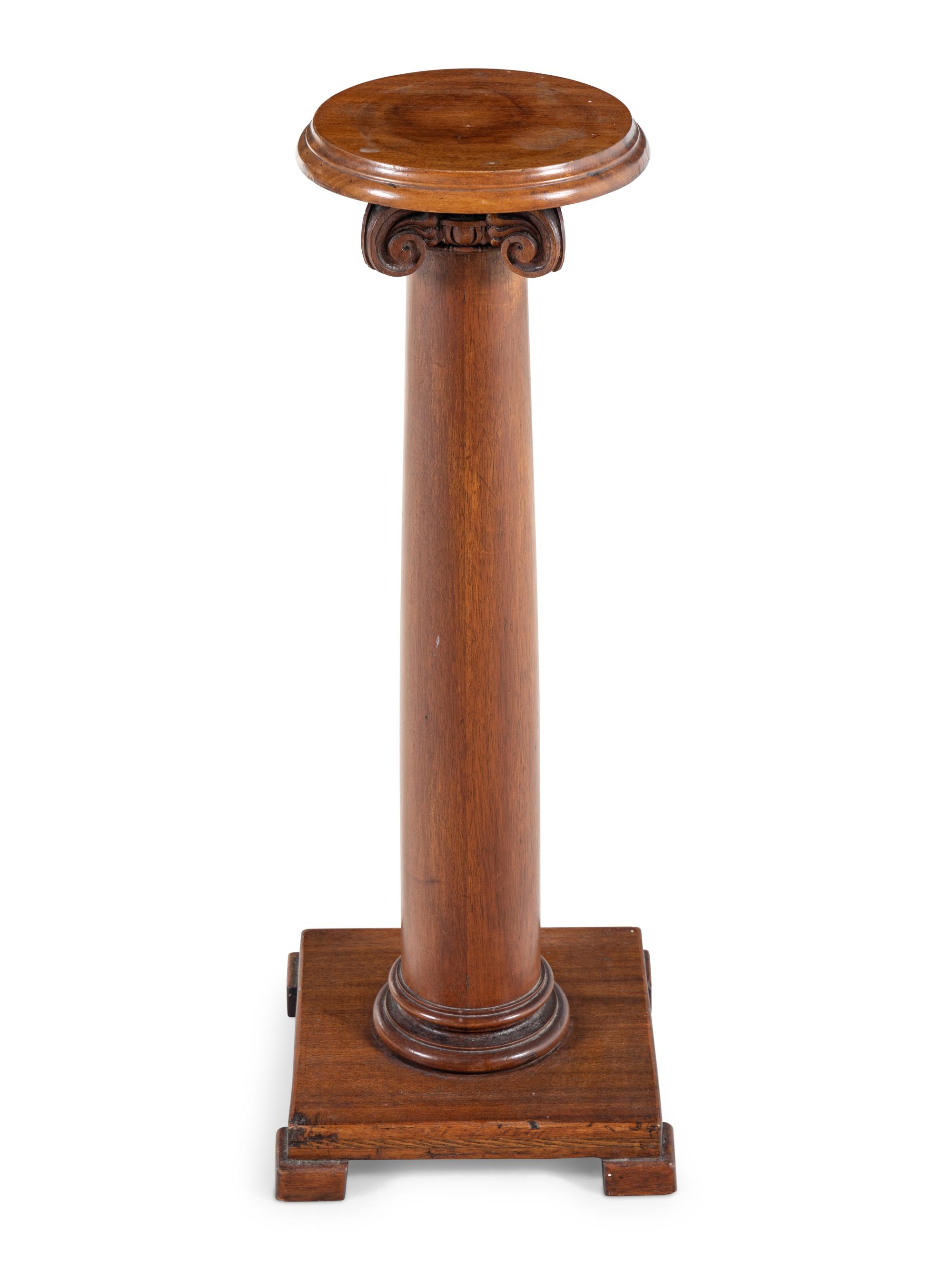 A Carved Mahogany Pedestal