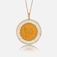 An eighteen karat gold coin pendant