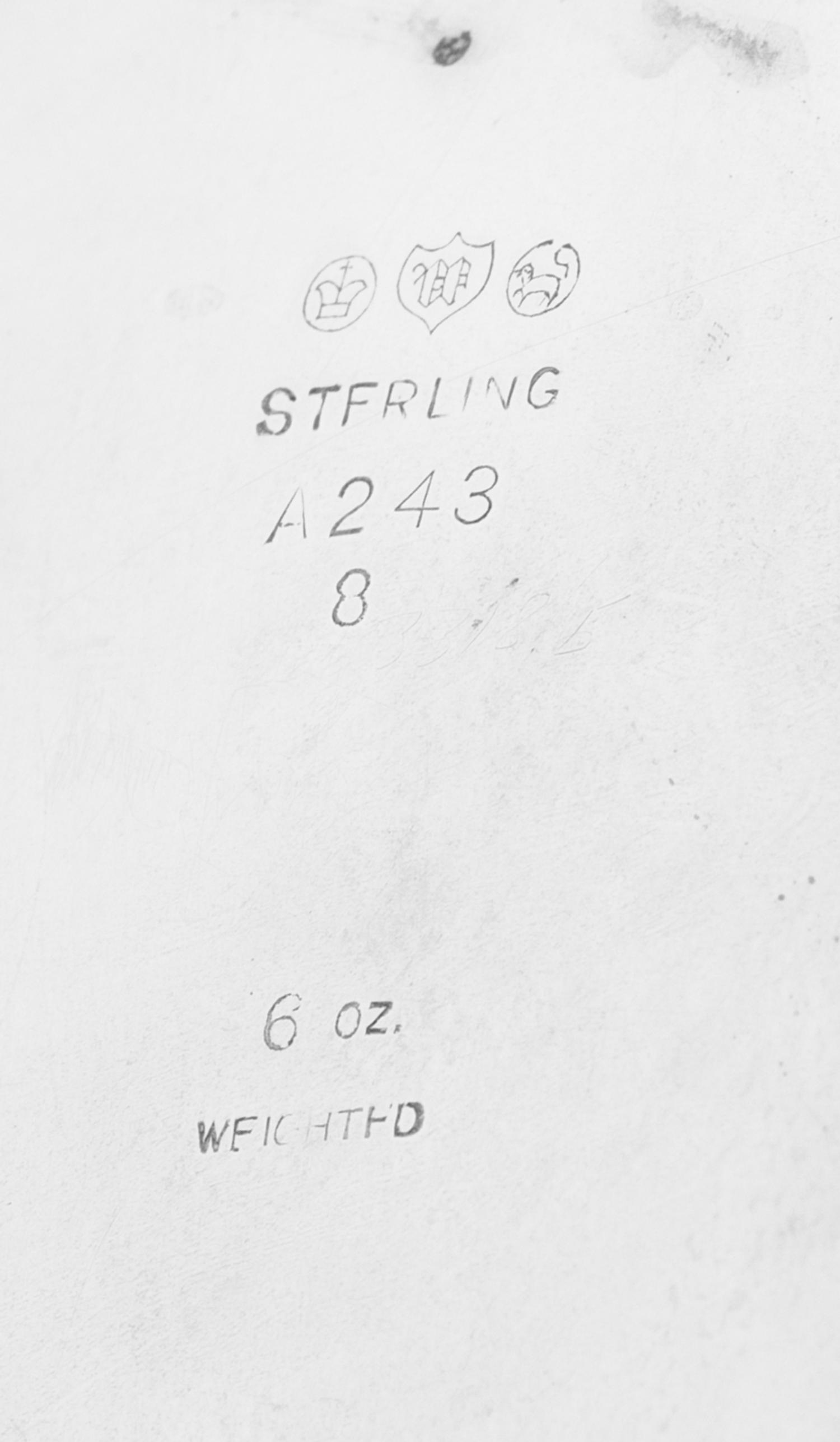 A Group of Four Silver Table Articles