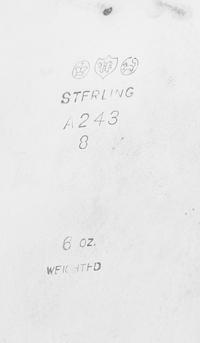 A Group of Four Silver Table Articles