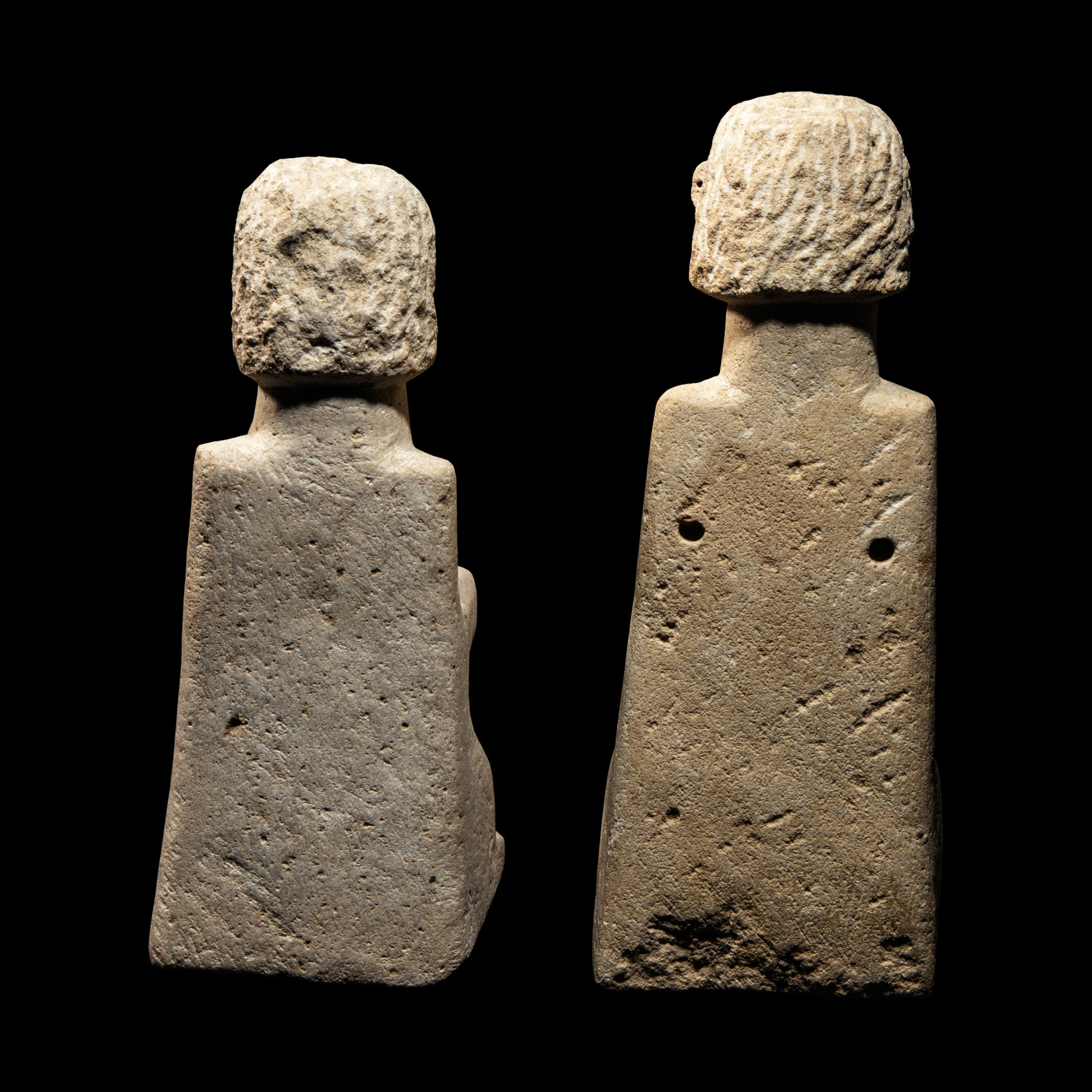 A Pair of South Arabian Limestone Seated Figures