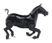A Pressed Metal Horse Carousel Figure