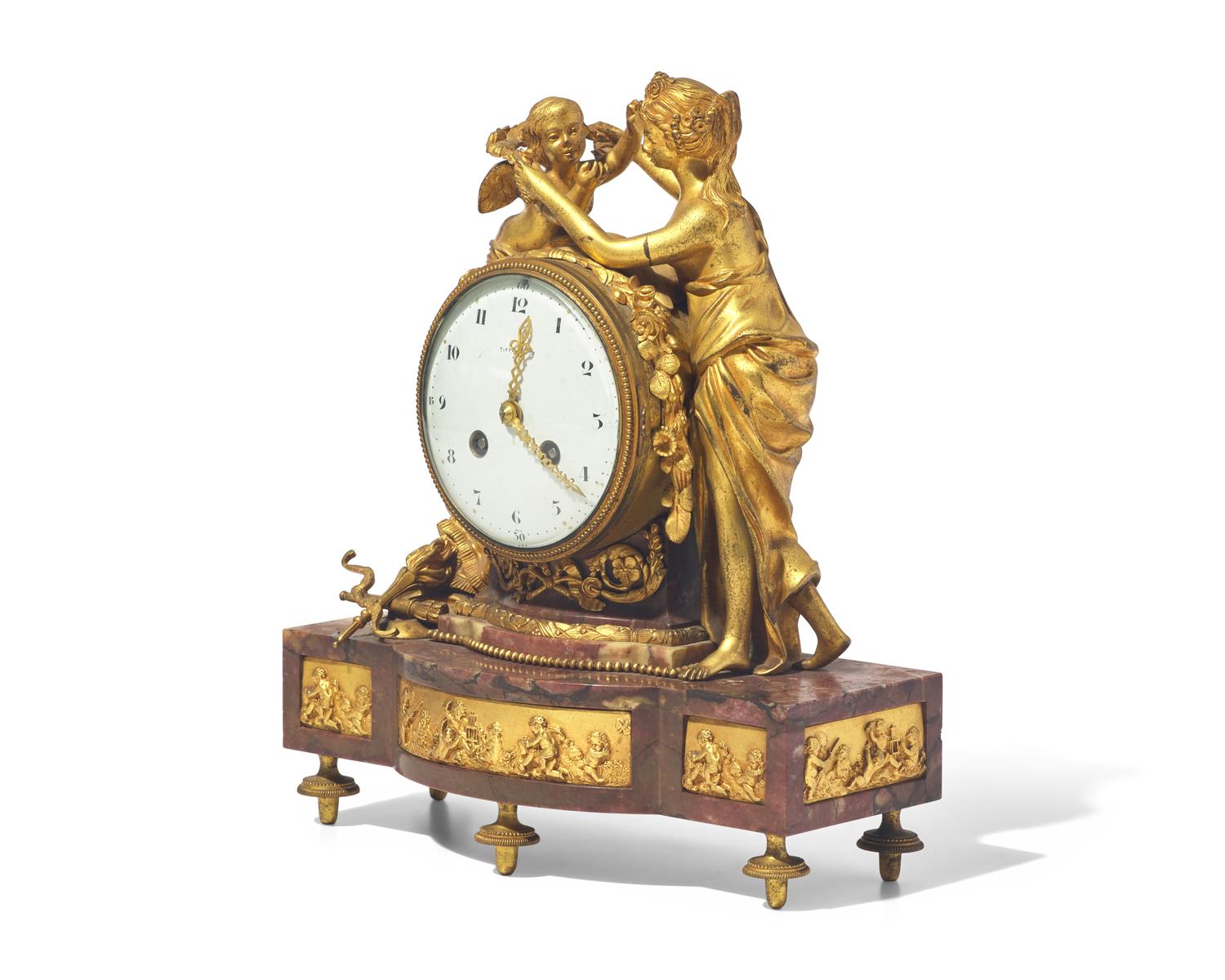A Louis XVI Style Gilt-Bronze Mounted Rouge Marble Mantel Clock