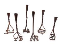 Six Branding Iron Candlesticks