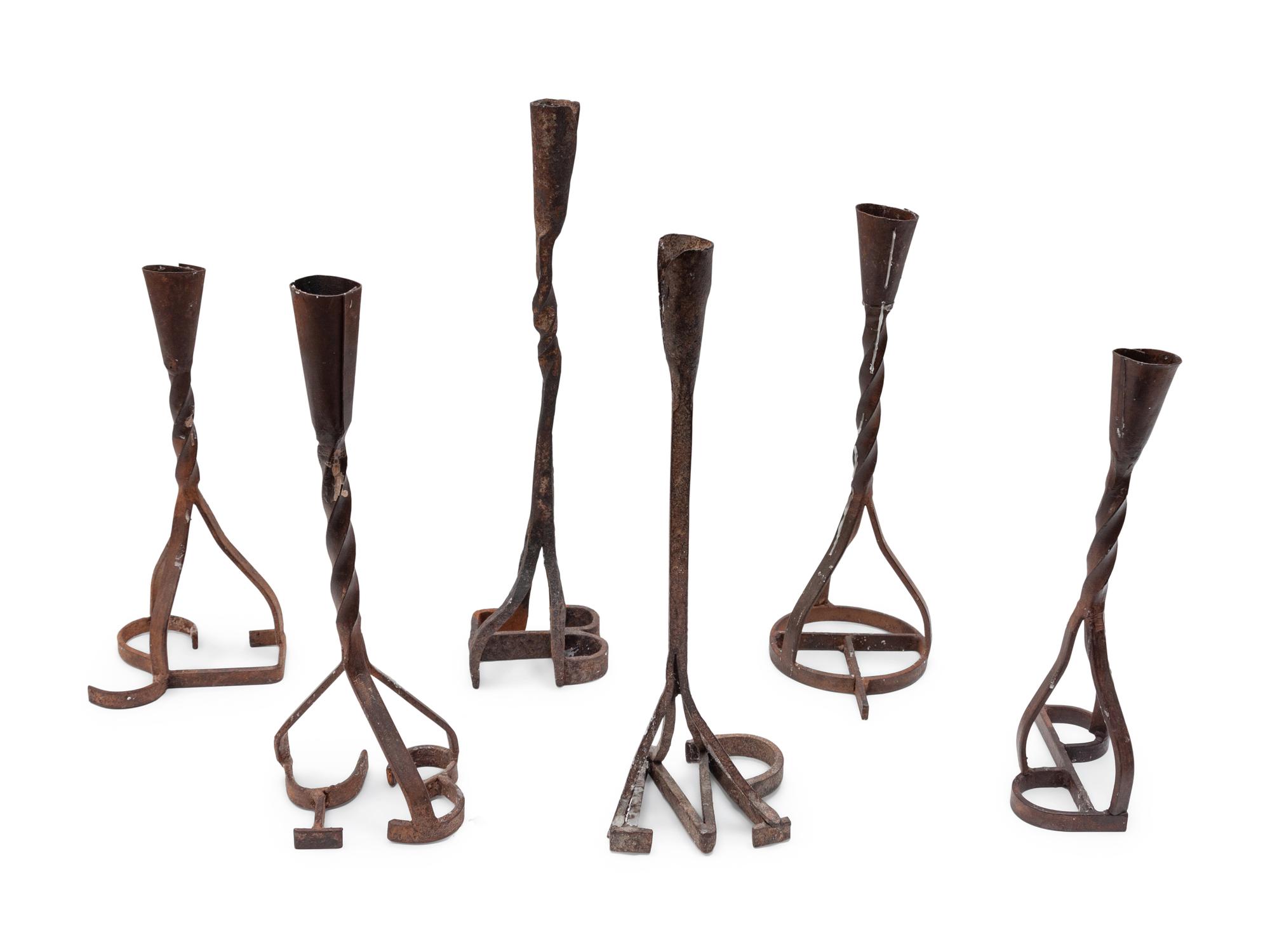 Six Branding Iron Candlesticks