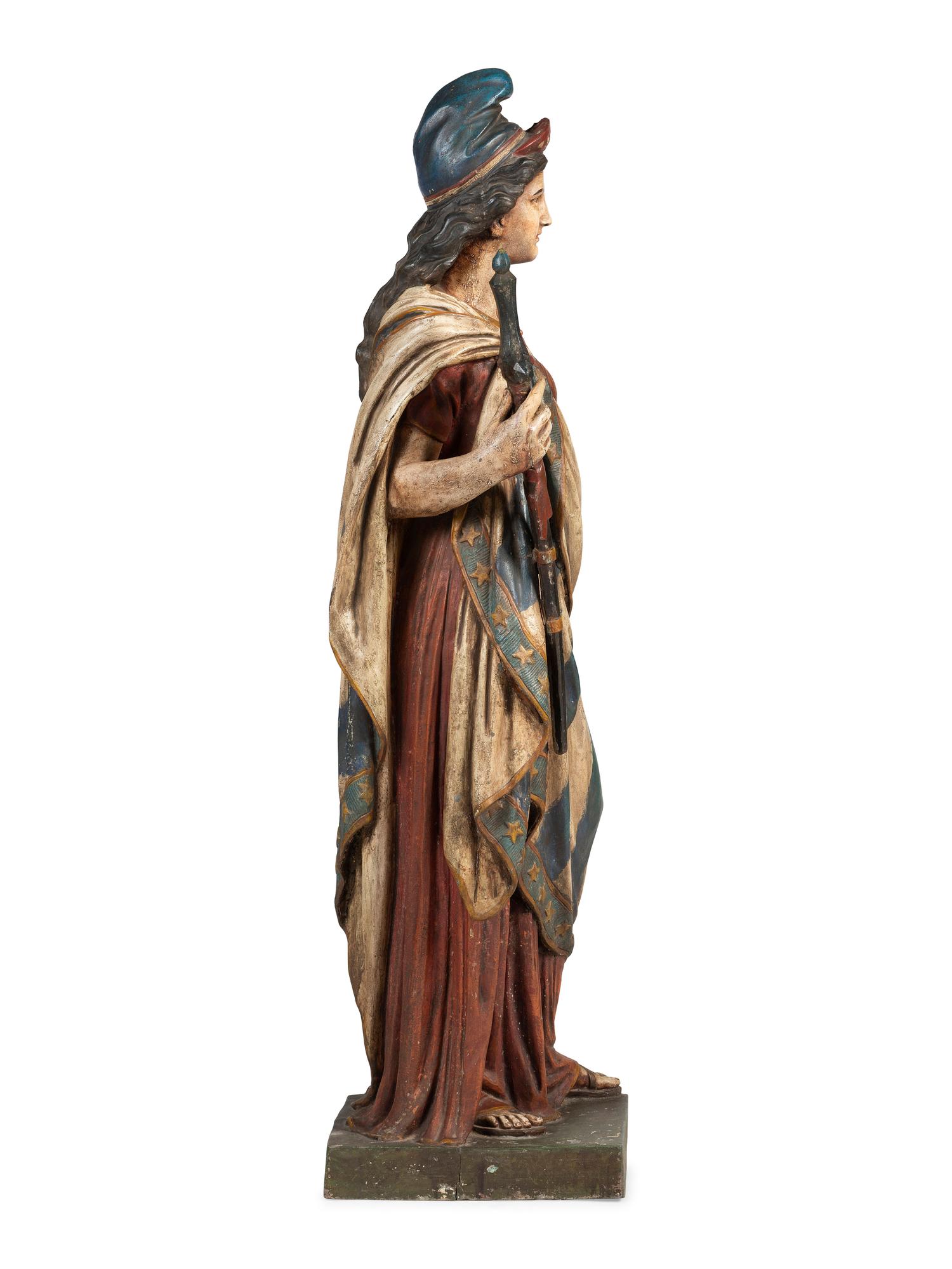 A Polychrome Painted Cast Zinc Goddess of Liberty Figure