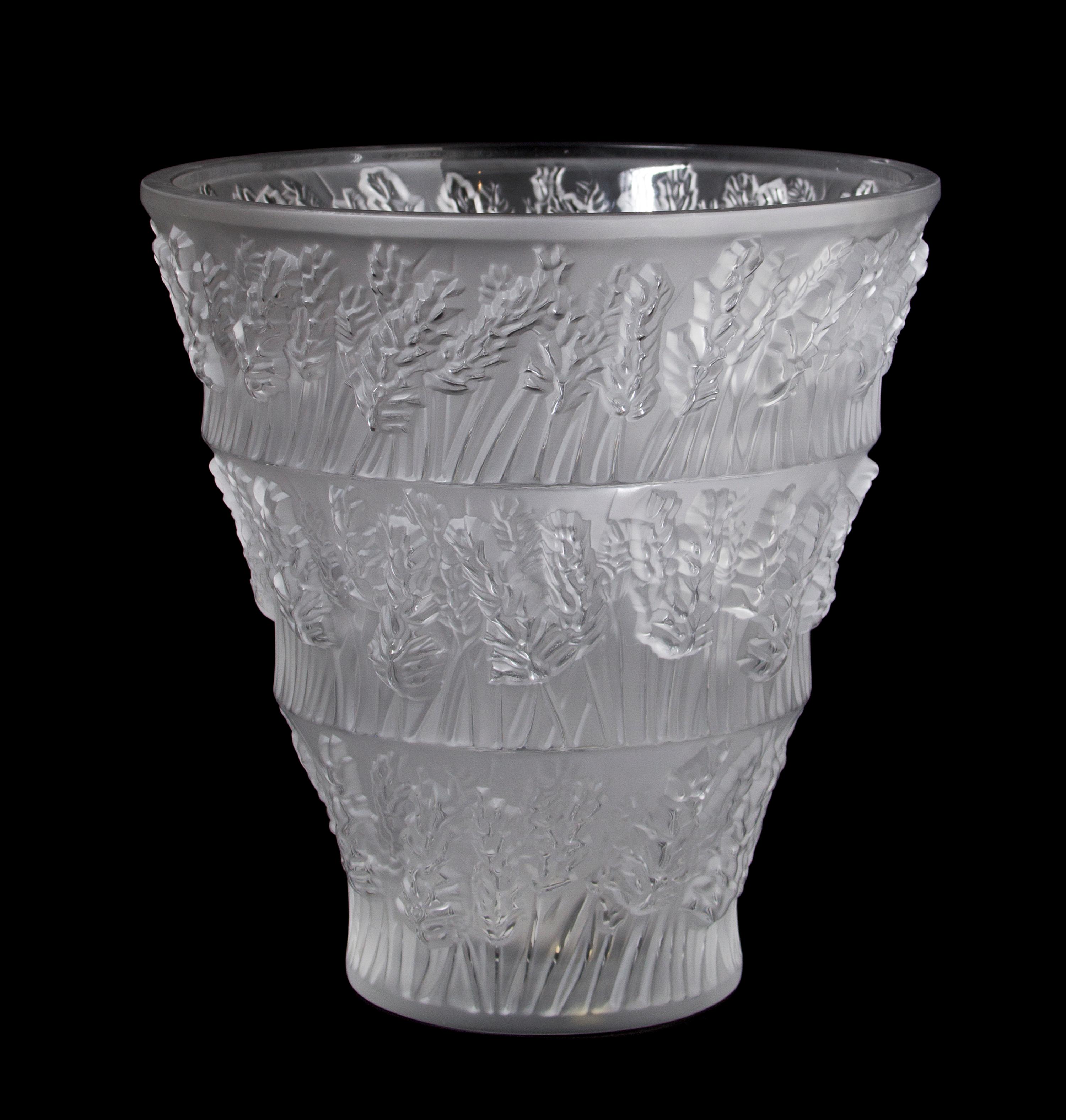 A Lalique Molded and Frosted Glass Vase, Height 9 5/8 inches.