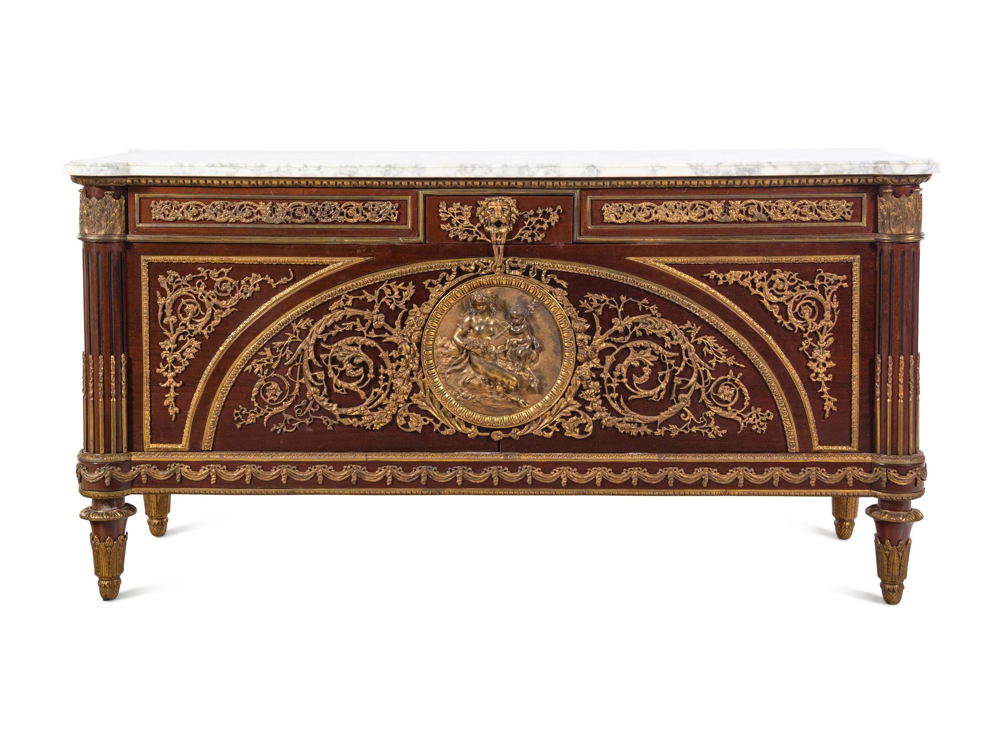 A Louis XVI Style Gilt Bronze Mounted Mahogany Marble-Top Commode à Vantaux After the Model by Guillaume Benneman