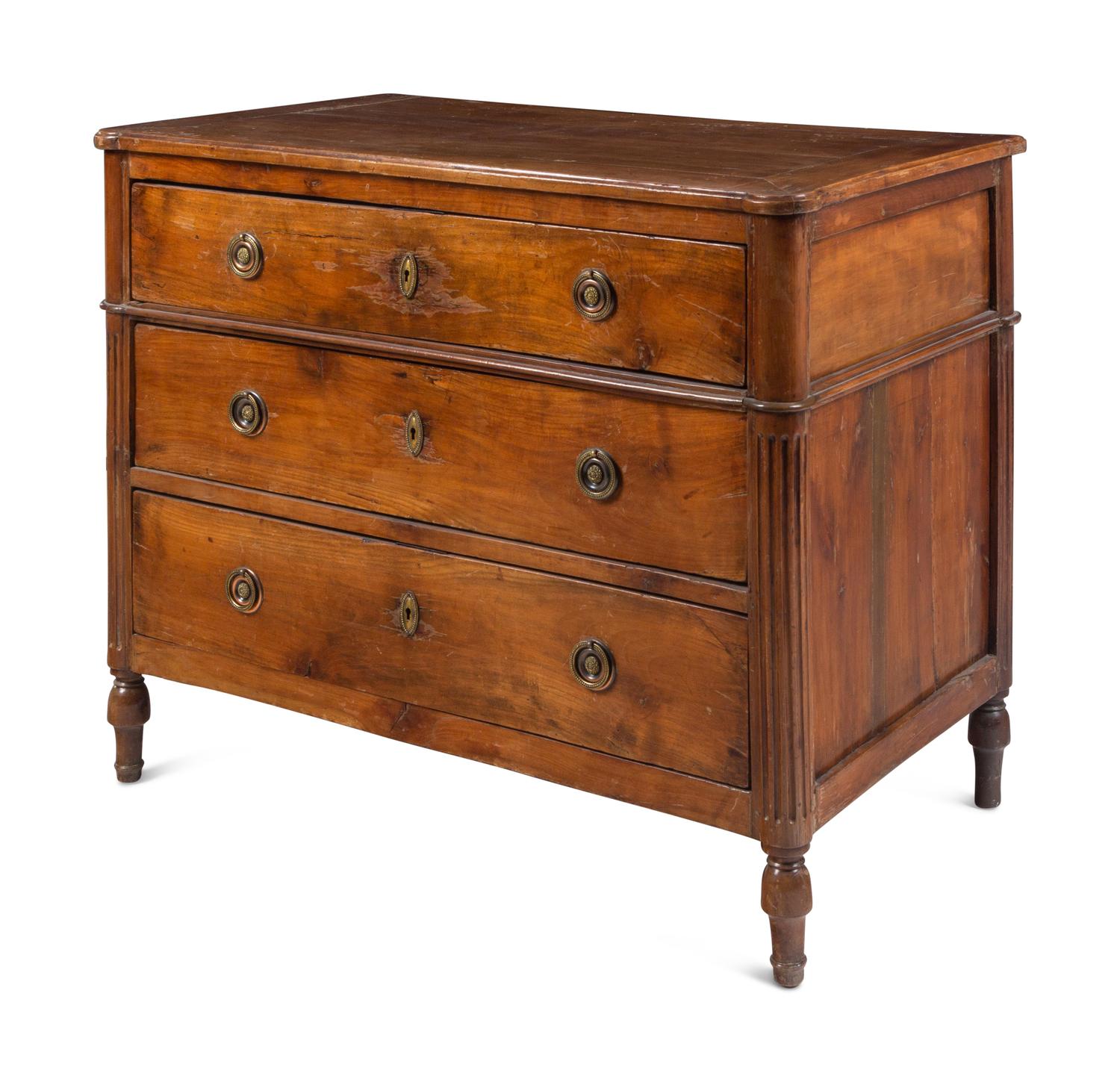 A Louis XVI Style Walnut Commode