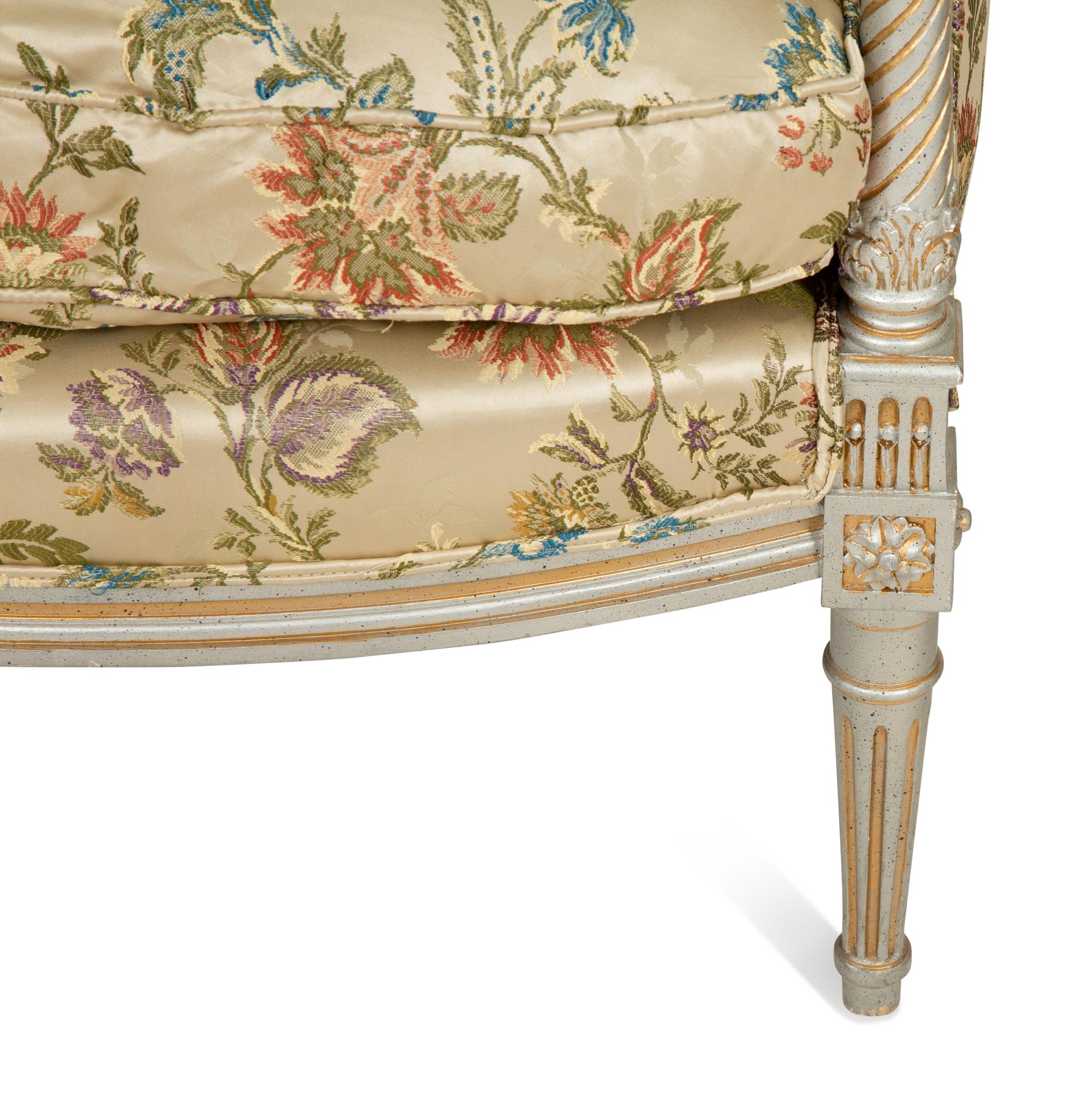 A Pair of Louis XVI Style Painted and Parcel Gilt Bergères
