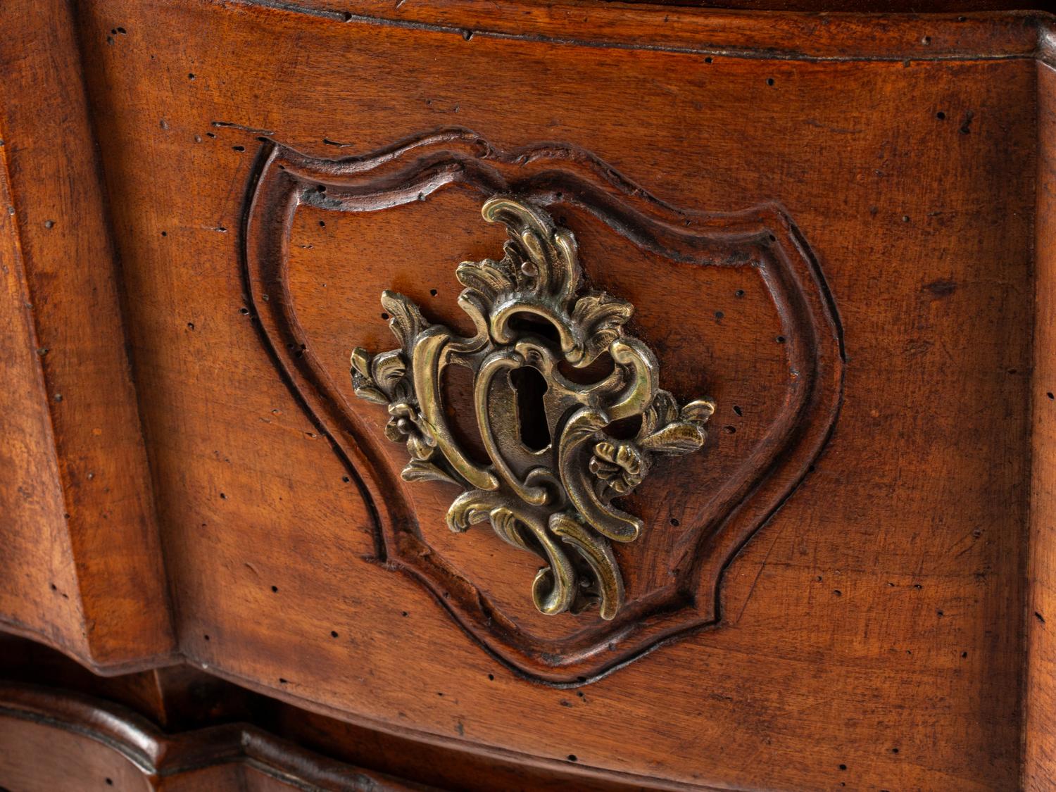 A Louis XV Provincial Walnut Commode