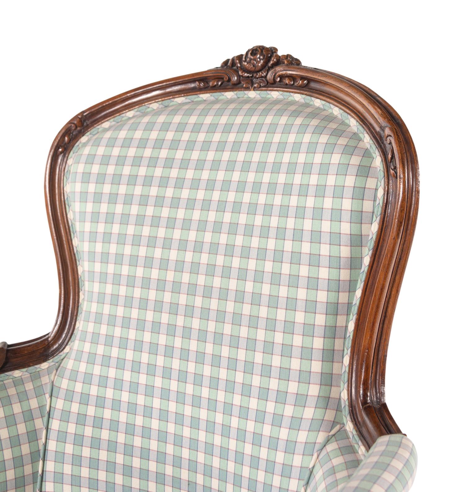 A Louis XV Style Walnut Bergère en Cabriolet