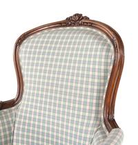 A Louis XV Style Walnut Bergère en Cabriolet