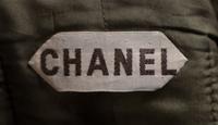A Chanel Haute Couture 1950s Boucle Skirt Suit, No size; Belt: 26"- 28" x .75".