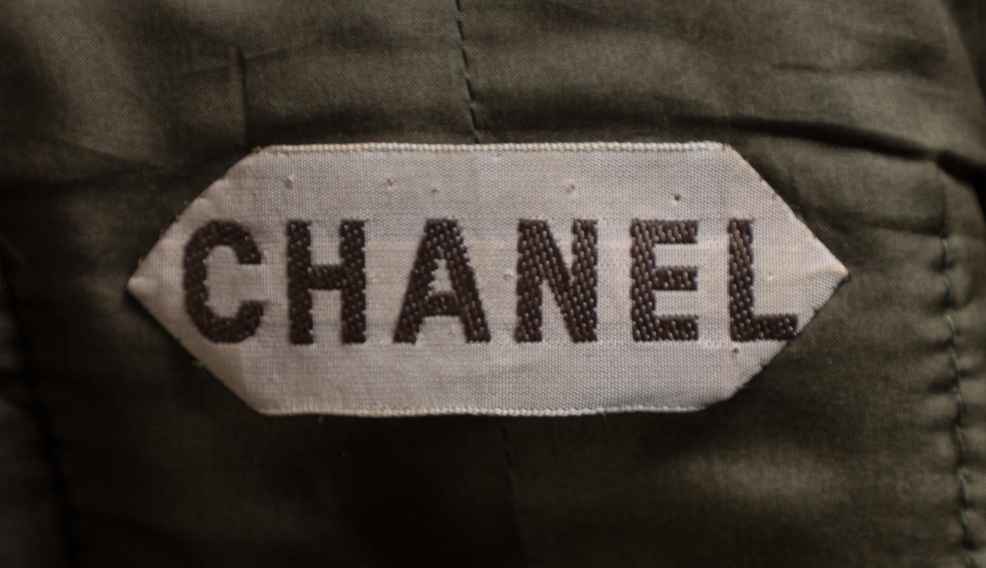 A Chanel Haute Couture 1950s Boucle Skirt Suit, No size; Belt: 26"- 28" x .75".