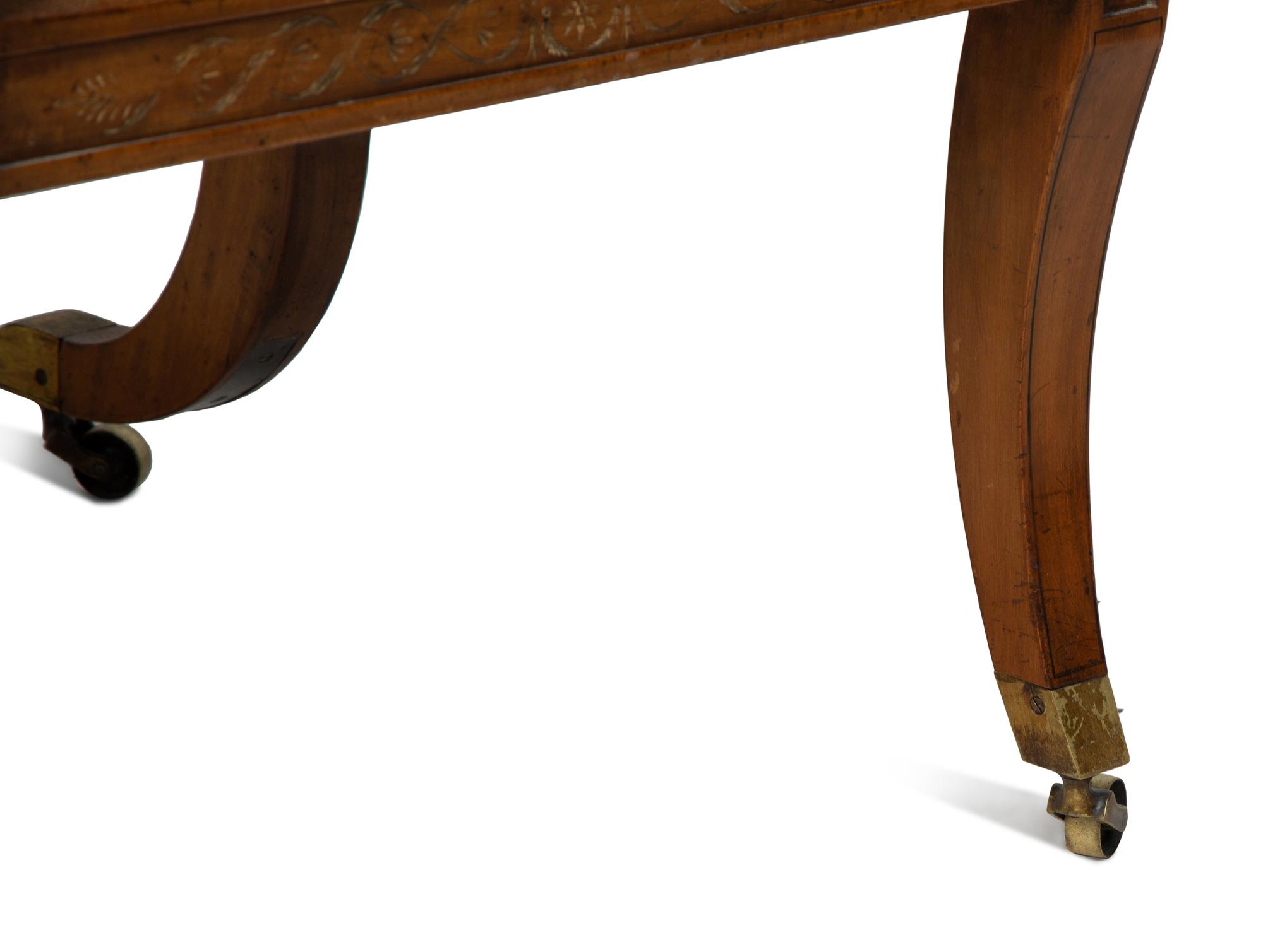A Regency Style Painted Satinwood Library Chair — 20TH CENTURY