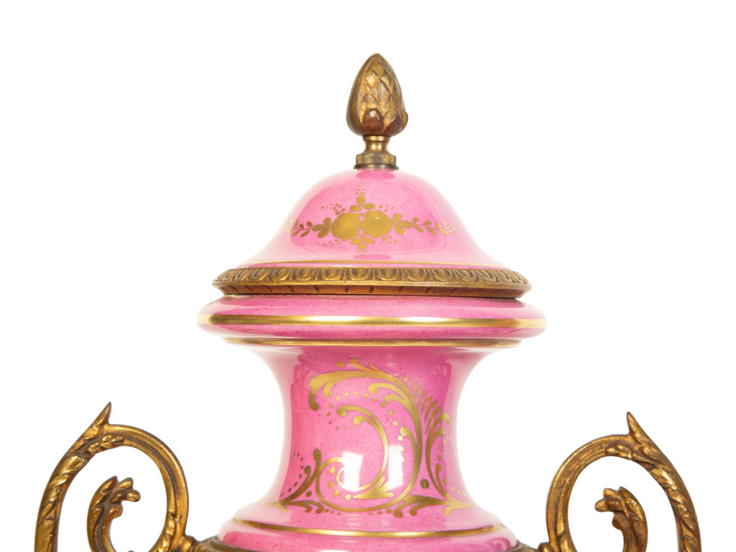 A Pair of French Porcelain Lidded Urns
