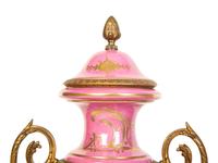 A Pair of French Porcelain Lidded Urns