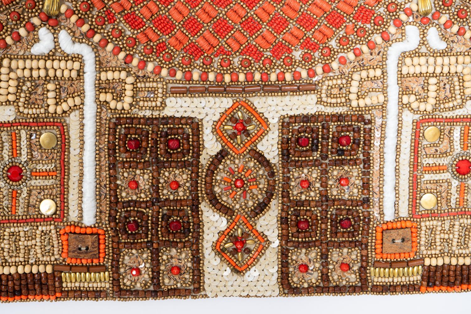 A Set of Four Kim Seybert Beaded Pagoda Placemats