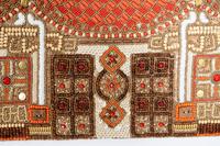 A Set of Four Kim Seybert Beaded Pagoda Placemats