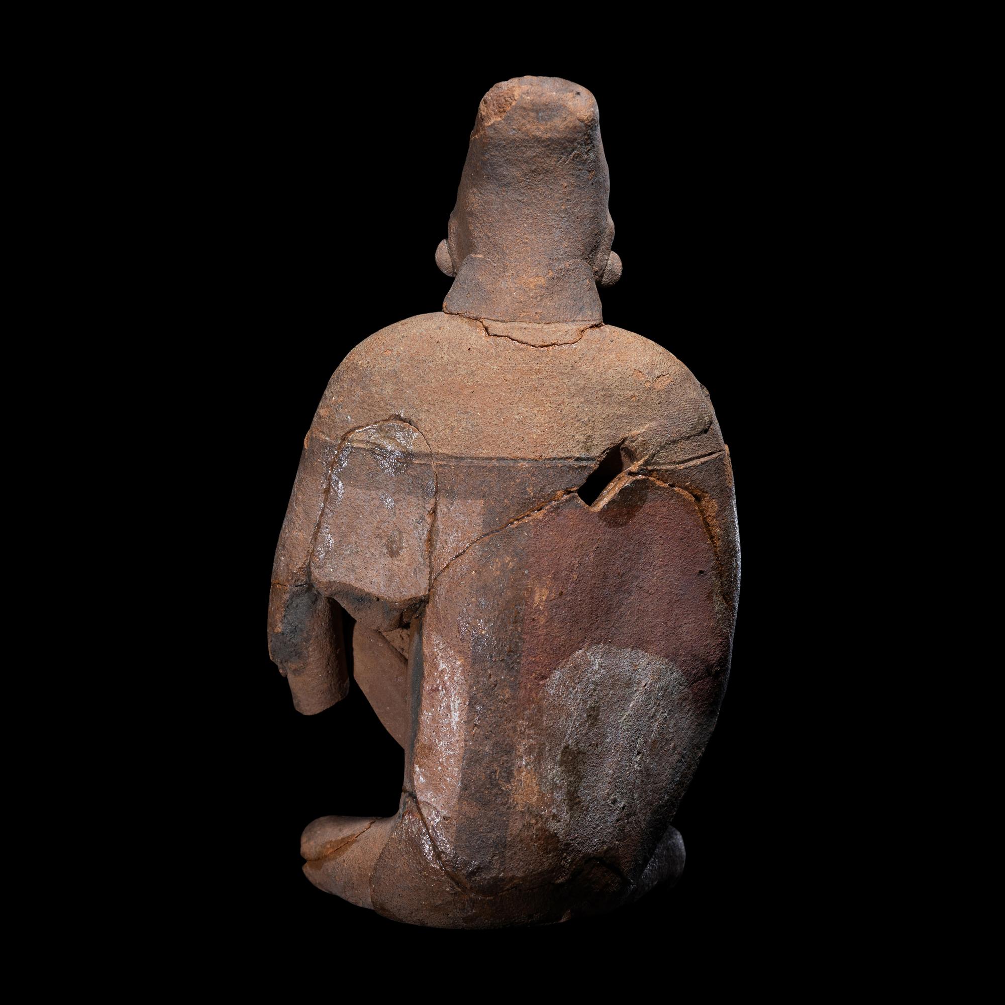 An Attic Red-Figured Squat Lekythos
